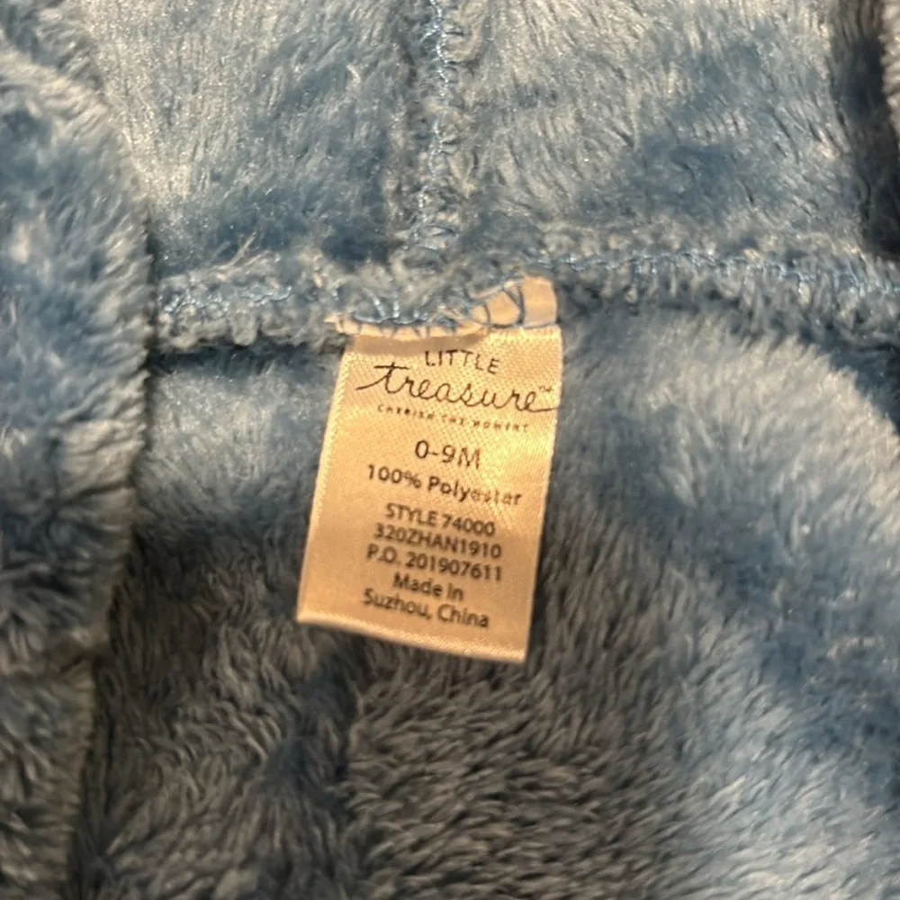 Very soft baby elephant robe with hood and tie. Blue in color! Very warm & soft